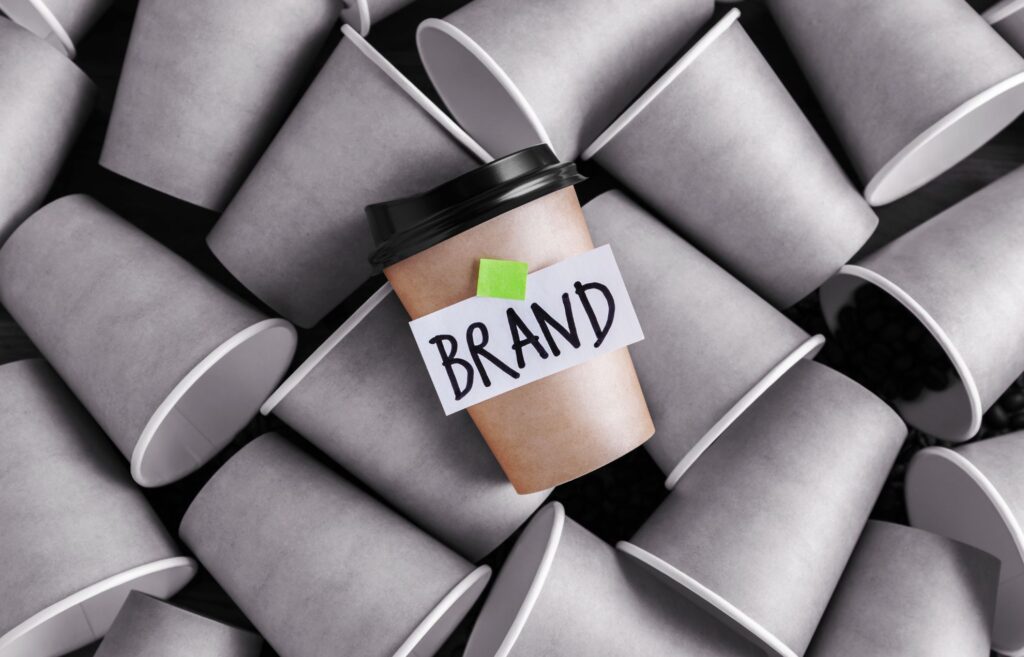 A coffee cup with a brand label on